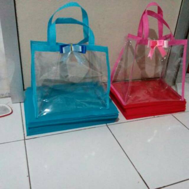 

Tas Full mika ( uk. 45x35 lbr 25cm )dg sablon + pita