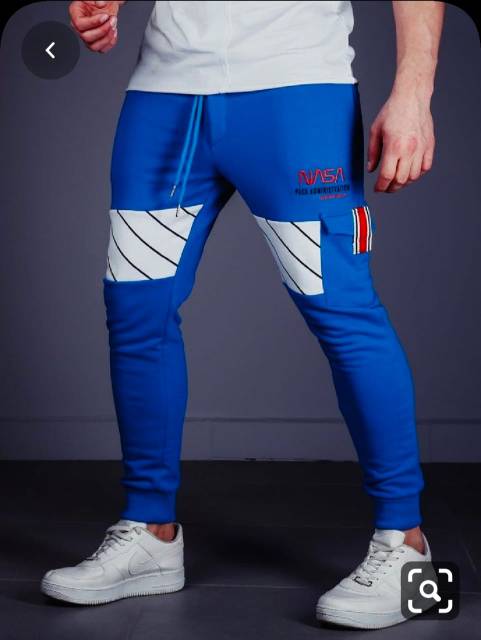 TOTOTAshop.Celana Jogger NASA JUMBO 34-38 FIT XL-XXL,Bahan Fleece tebal.Motif sablon.