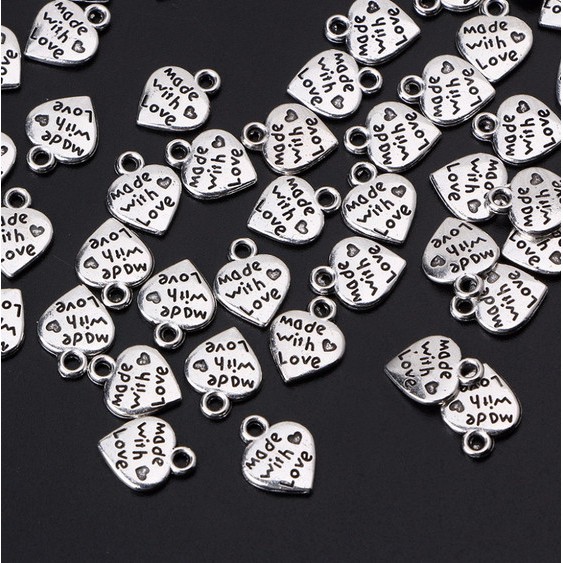 20 Pcs Liontin Manik-Manik Bentuk Hati Bahan Metal Warna Silver Untuk Gelang Dan Kalung Charms