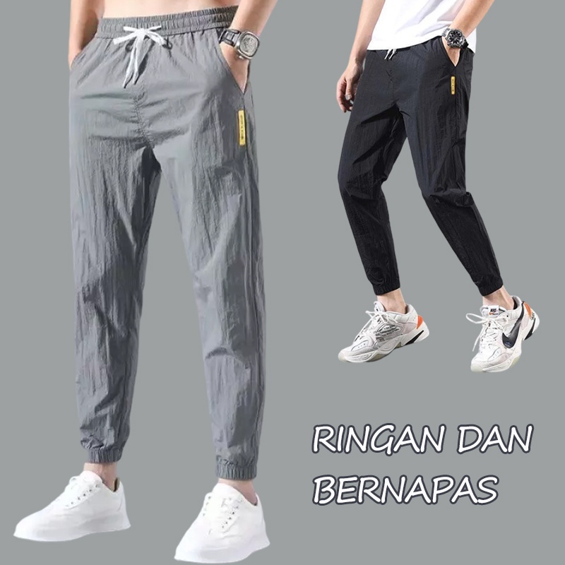 Celana Kasual Pria celana linen  Panas  Tren Bundel Kaki Longgar Olahraga celana korean style pria Es Sutra Pria Baru Bagian Tipis Cepat Kering Celana Sembilan Titik ankle pants pria