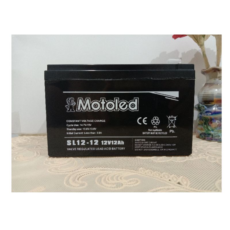 Aki Sepeda Listrik / Aki Selis ( 12V / 12 AH ) merk Motoled pala skun( 15*9,8*9cm)/(berat 3kg)-1
