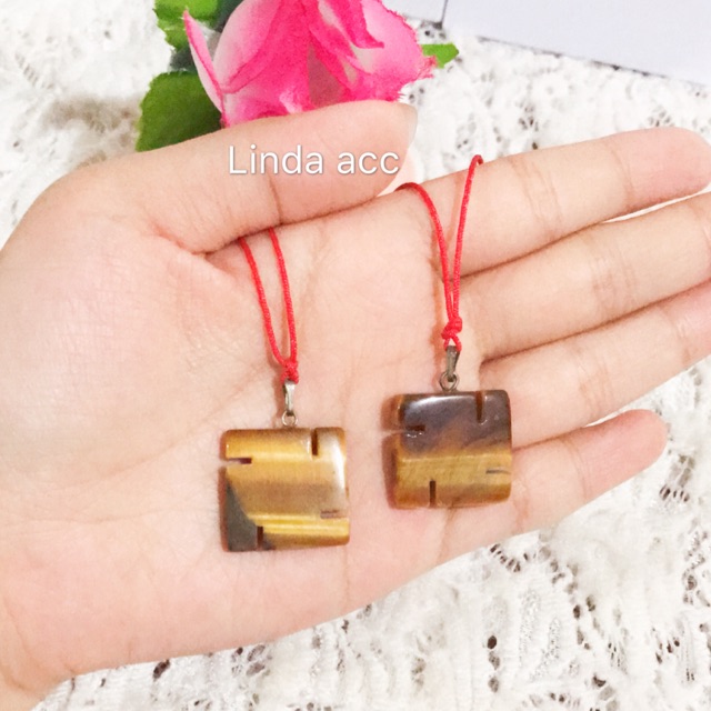 kalung giok swastika