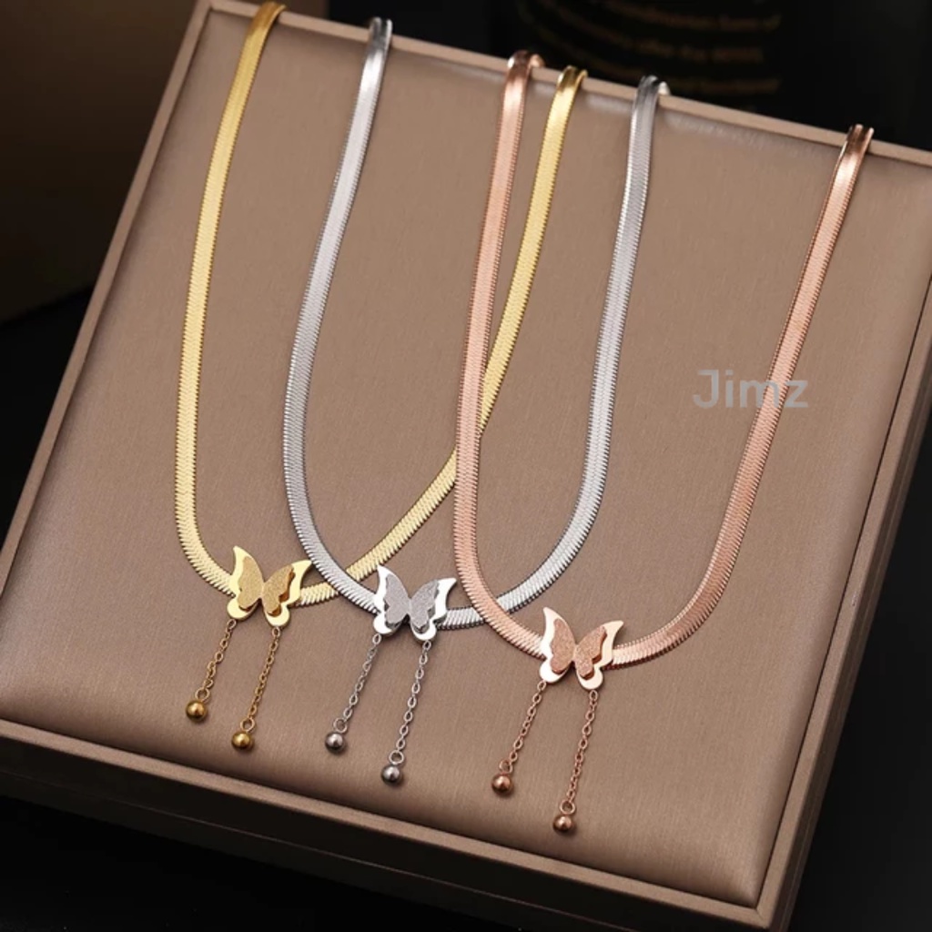 Kalung titanium kupu- kupu gold juntai