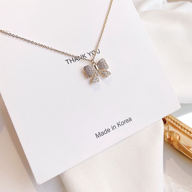 Kalung Titanium Ribbon Mata Tanam Wanita Korean