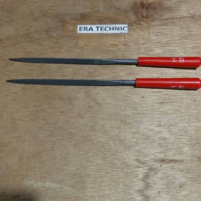 

Kikir segitiga ukuran 5 x 180