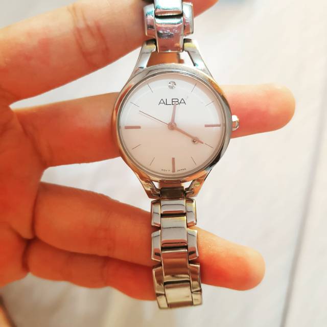 Preloved Alba Jam Wanita second