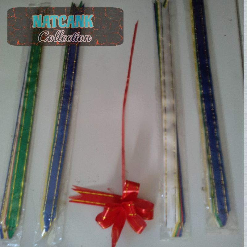 

MAINAN ANAK PITA TARIK JADI BUNGA HIASAN