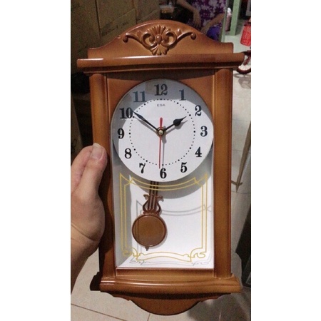 jam dinding bandul murah motif kayu