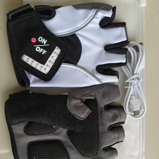 Sarung tangan sepeda sein/led otomatis.