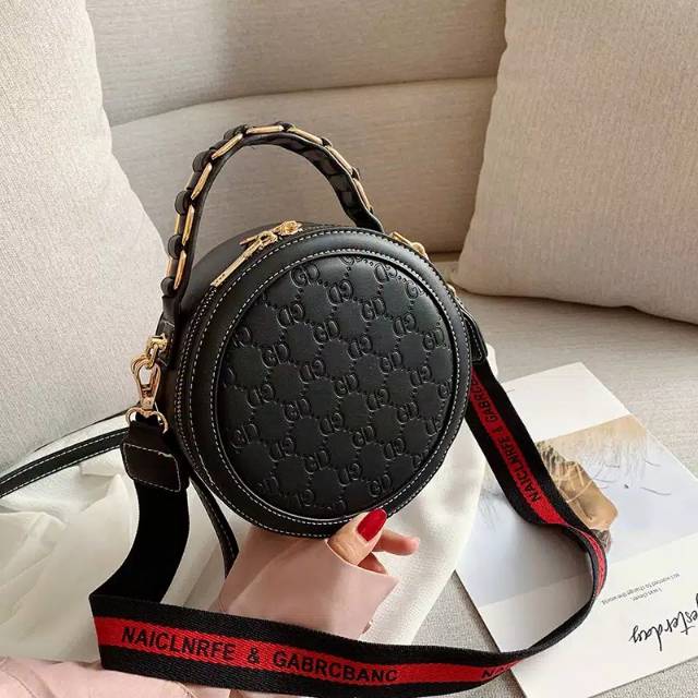 Tas selempang GD bulat