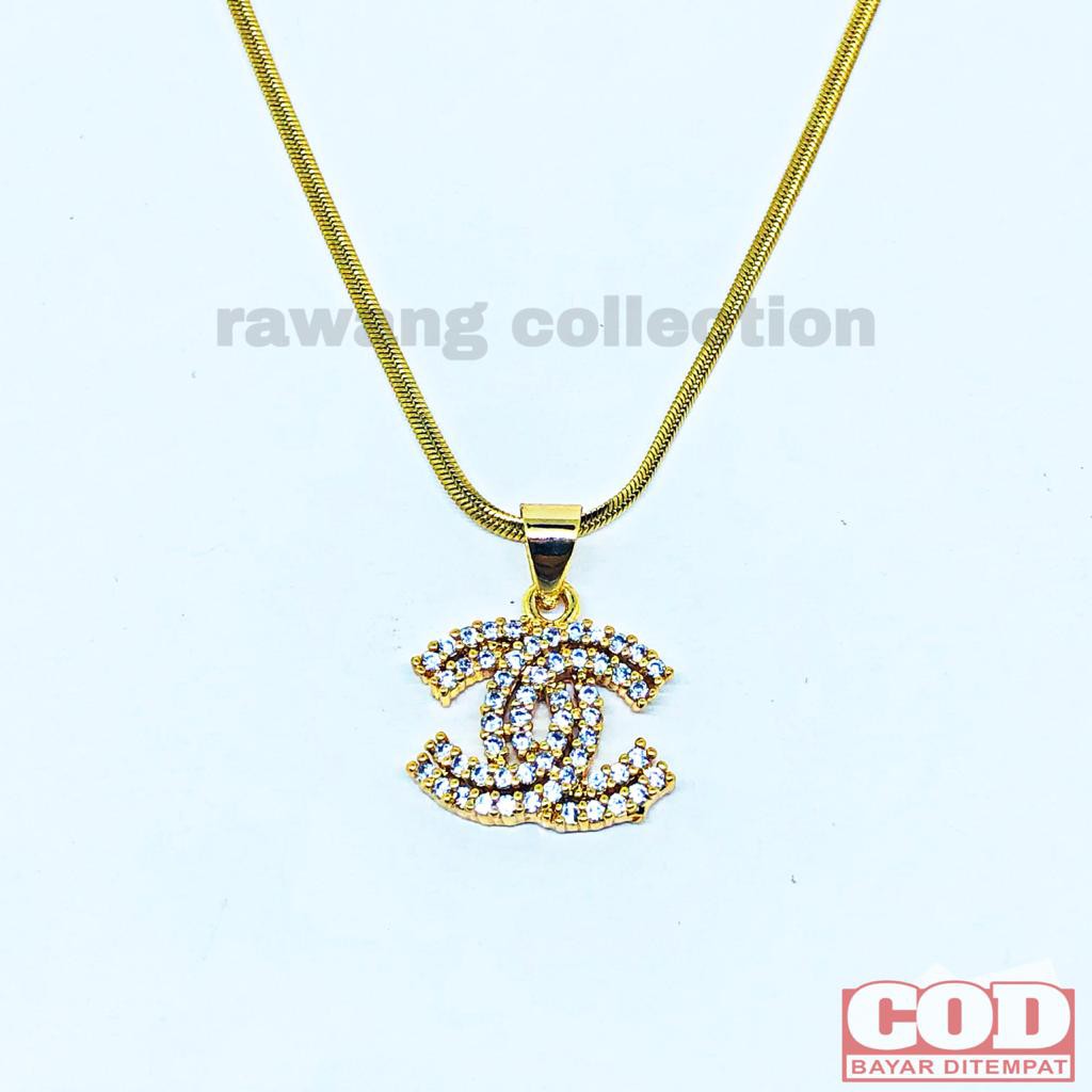 kalung titanium gold plus liontin anti karat selamanya