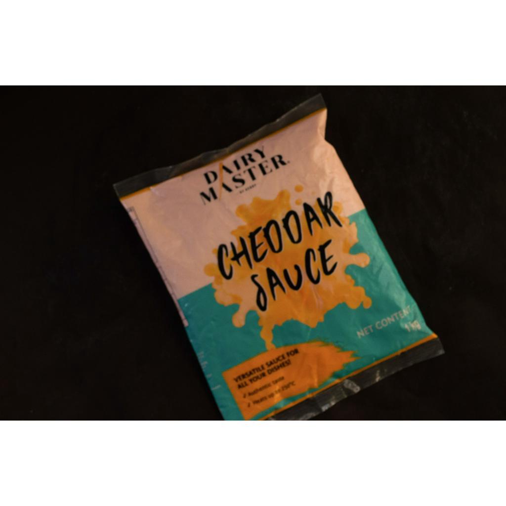 

CHEDDAR CHEESE SAUCE DAIRY MASTER 1KG SAUS KEJU