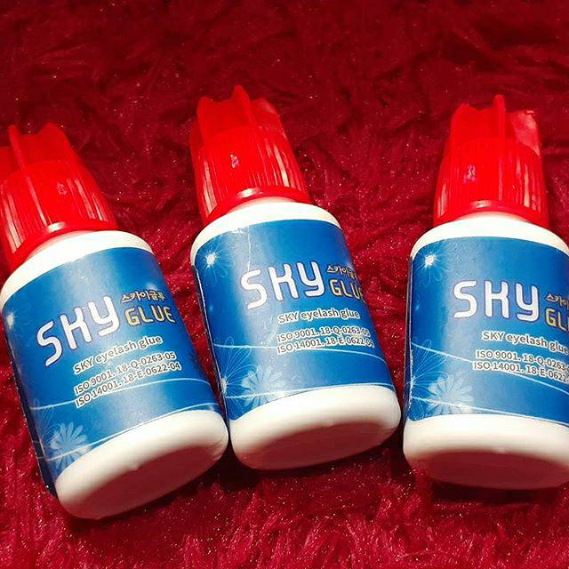 

Lem sky tutup merah