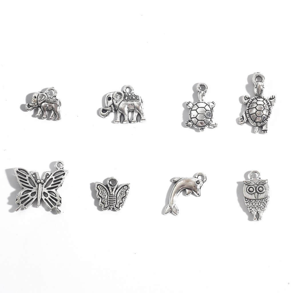 10-30 Pcs / Ppack Liontin Bentuk Hewan Lapis Perak Bahan Alloy Gaya Antik Kuno Untuk Perhiasan