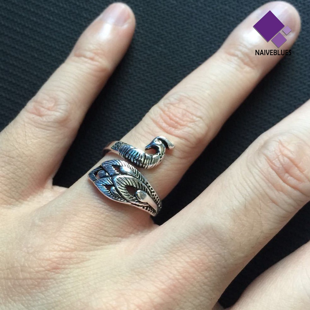 Cincin Model Terbuka Adjustable Desain Merak Warna Silver Gaya Retro