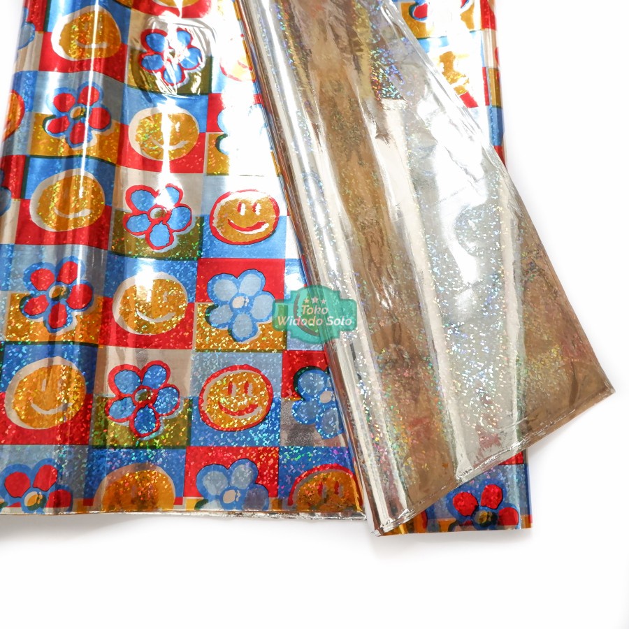 

Plastik Kado Hologram Kado Smile 50x65cm - 10 Lembar
