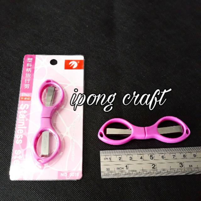 

Gunting Lipat Kacamata