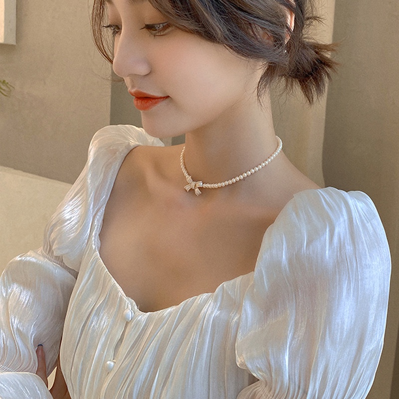 Fashion Elegant Pearl Bow Necklace for Women  Light Retro Luxurious French Accessories