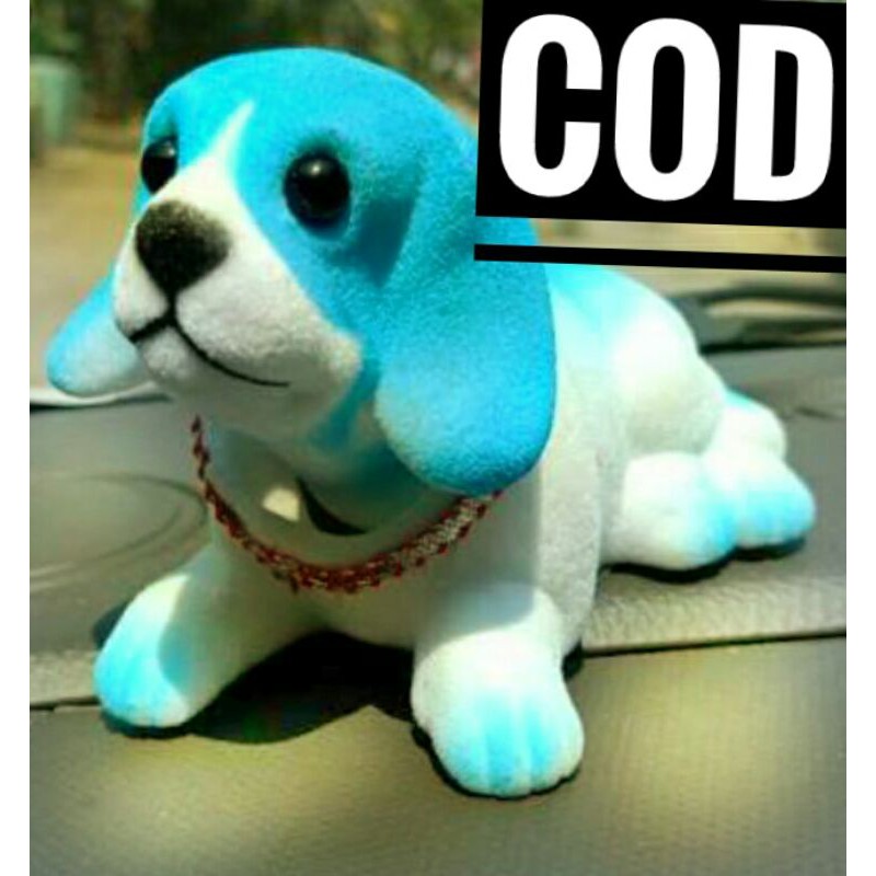 boneka anjing kepala goyang