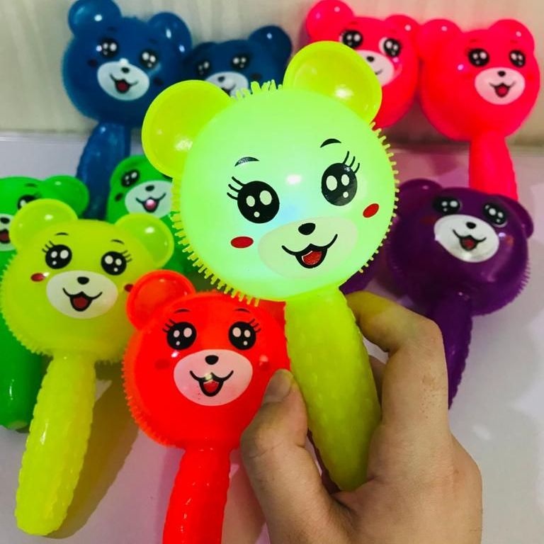 Tomikotoys Rubber Stick Toys Boneka Lampu Dan Suara