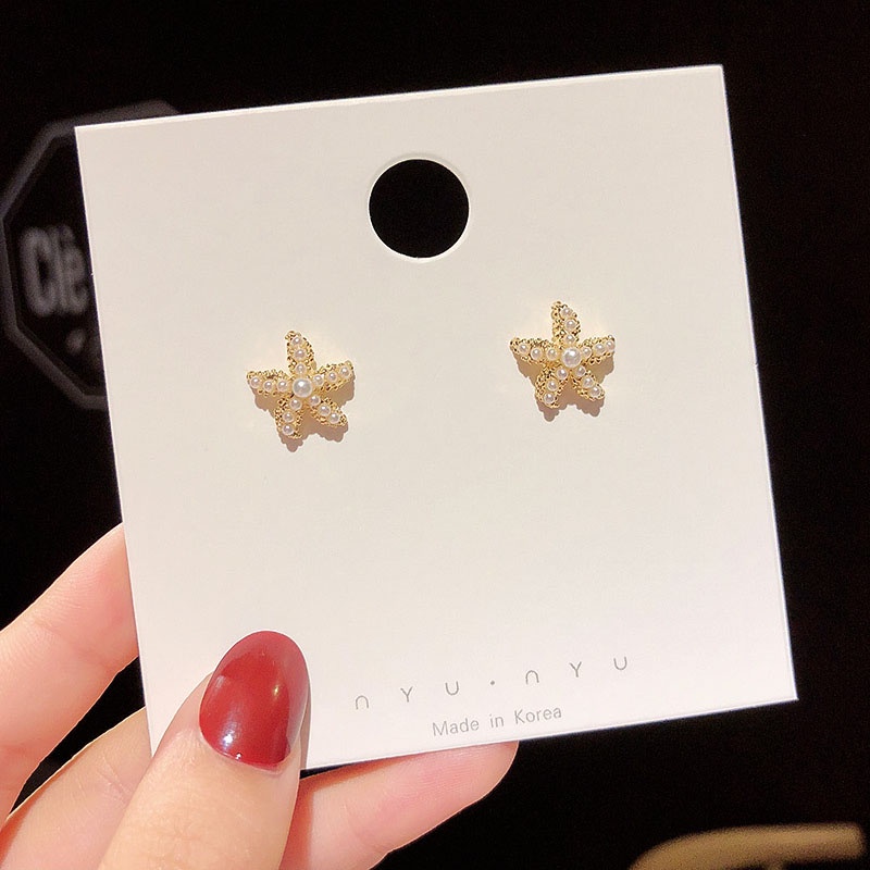 Anting Stud Desain Bintang Laut Aksen Mutiara Bahan S925 Silver Untuk Wanita