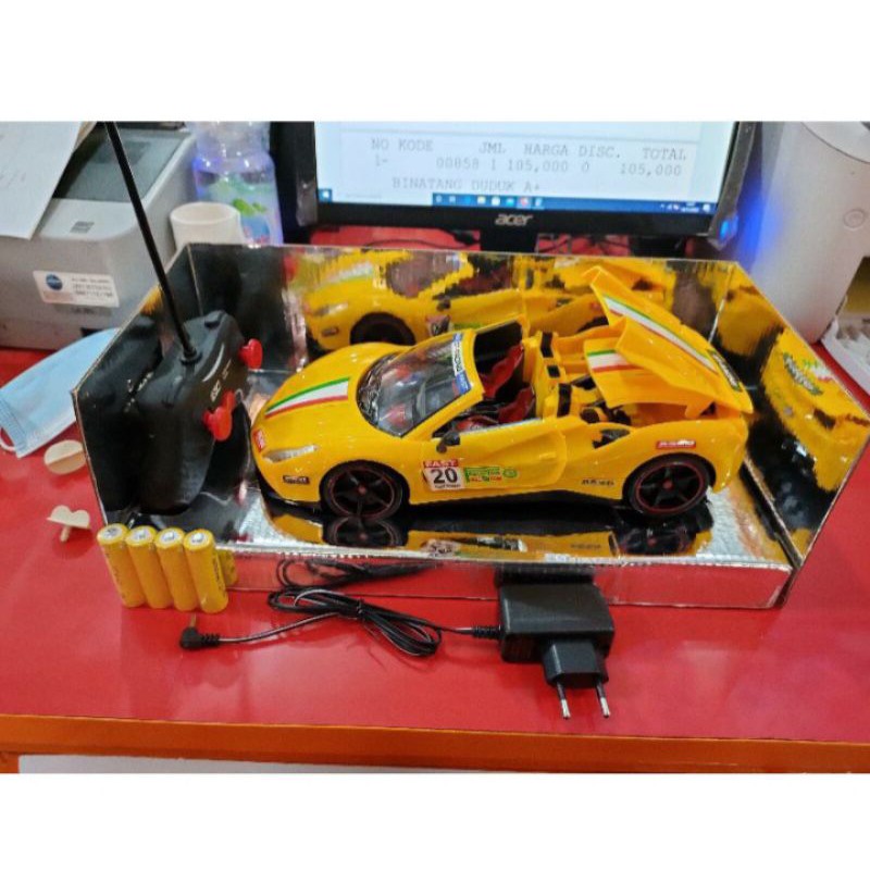 Mobil Remote Ferrari Buka Pintu Charger