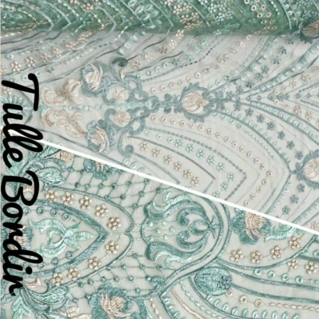 Kain motif gaun dan baju pesta