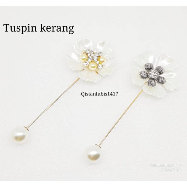 Tuspin kerang bunga