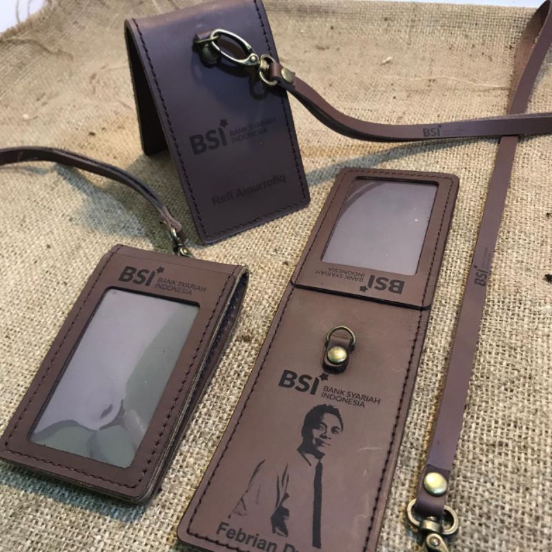 

Lanyard id card holder model lipat magnetik kulit asli premium free custom logo dan tulisan instansi proses cepat dan murah