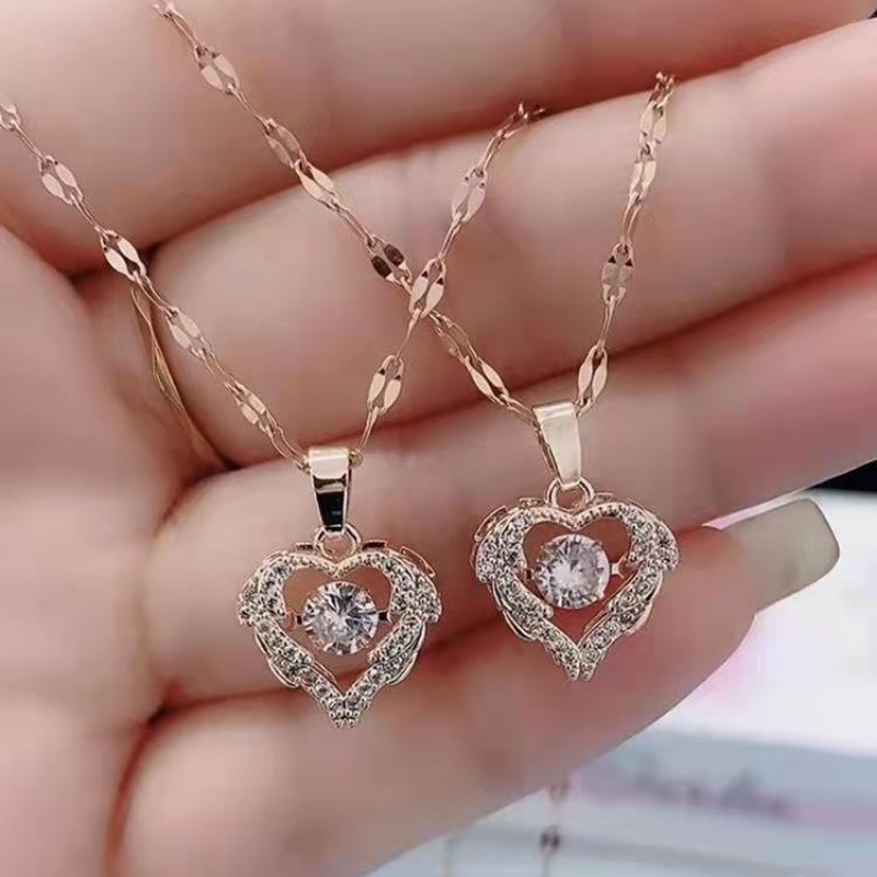 Kalung Liontin Hati Bahan Titanium Steel Warna Emas Untuk Wanita