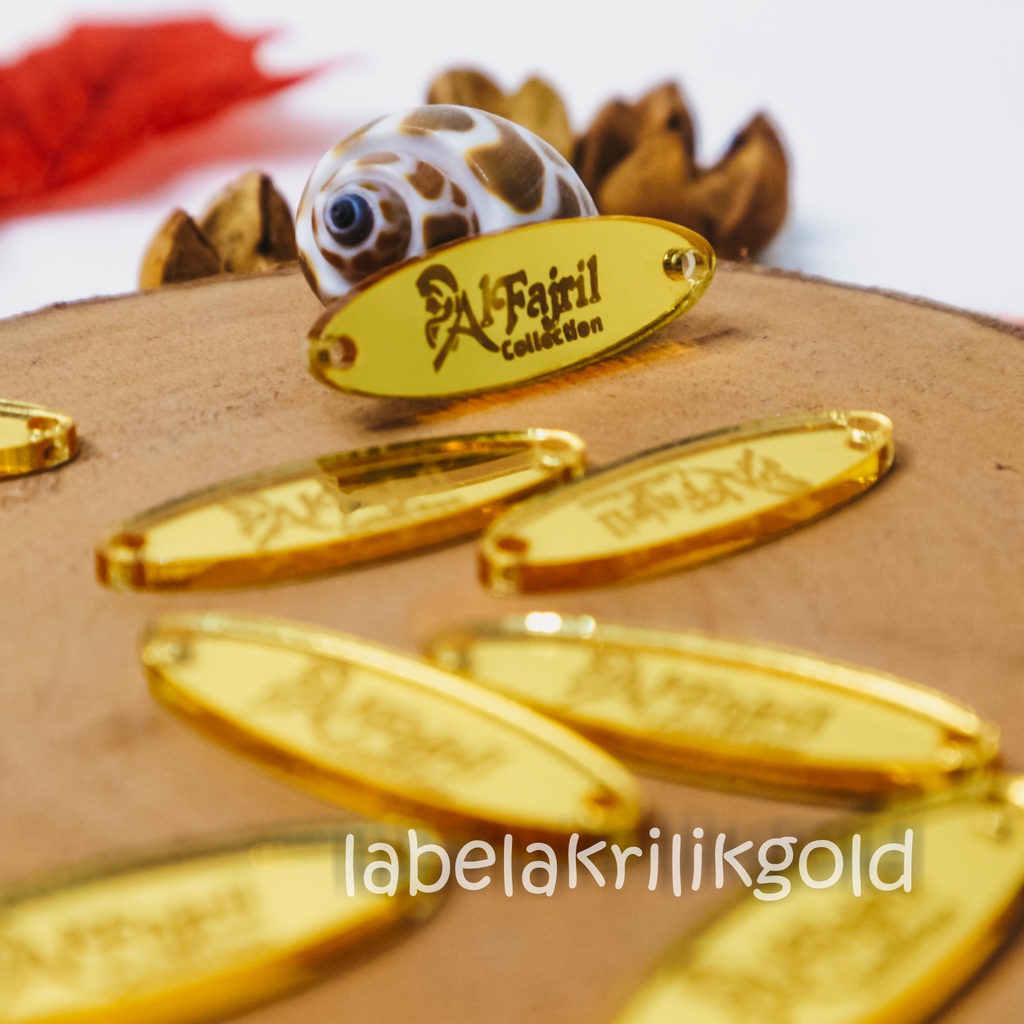 

label hijab | label baju | label akrilik | custom label | label jilbab | label cutting | label gold