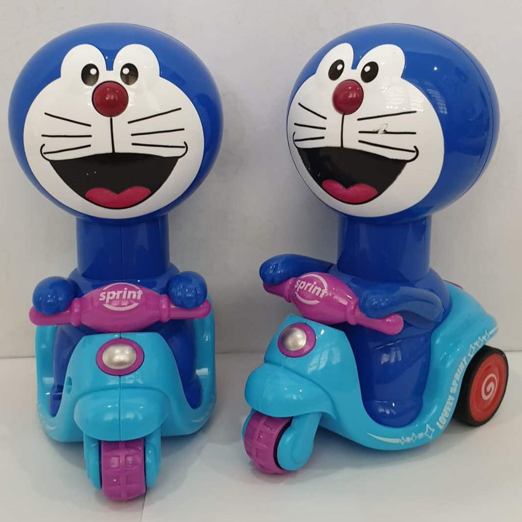 Mainan Motor Vespa Manual Doraemon [ Bisa Jalan Tanpa Batrei ]