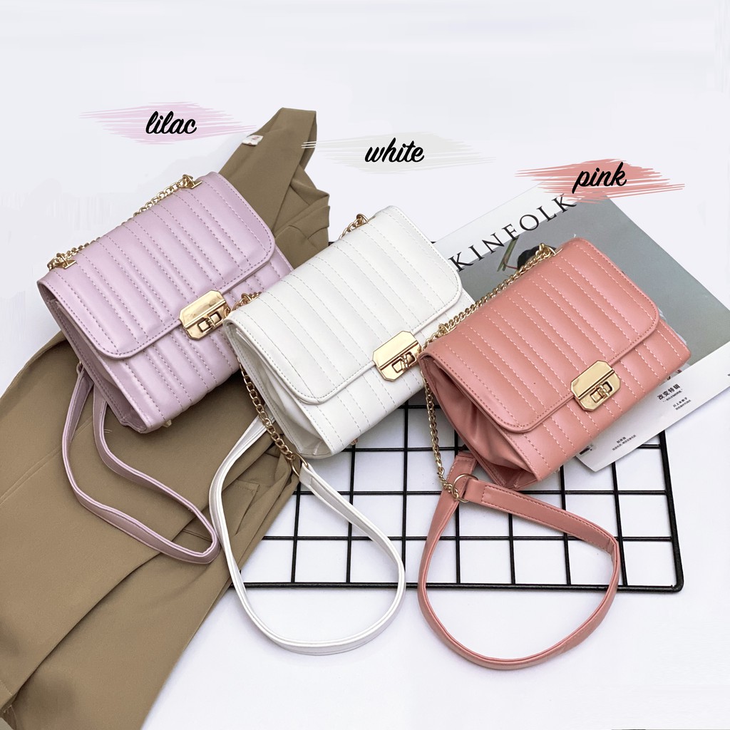 Slingbag Poppy Embos - Tas Selempang Wanita