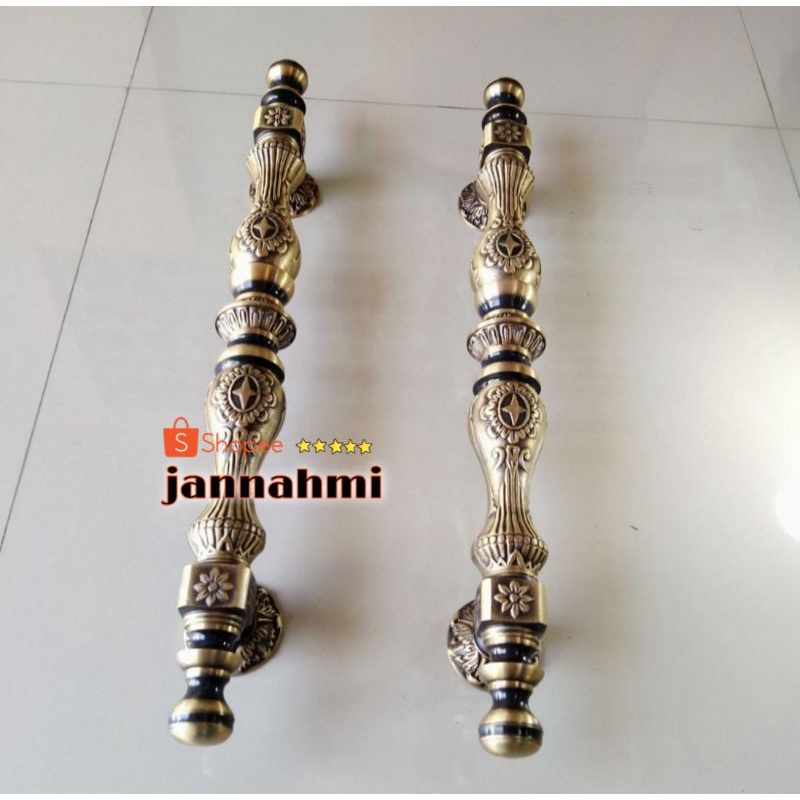 handle pintu kuningan ukir baut tembus