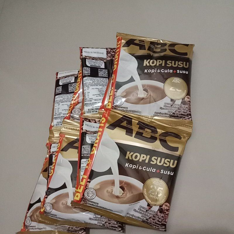 

Abc kopi susu kopi dan gula ditambah susu 1renceng isi 11