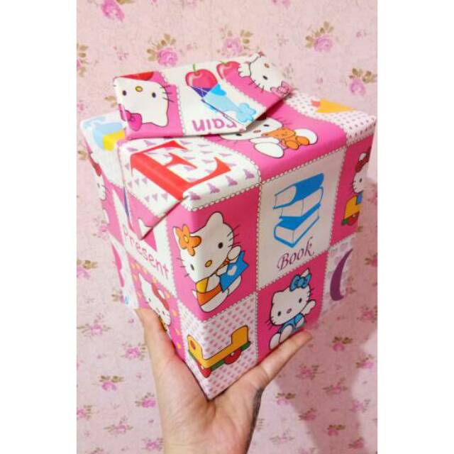 

Kertas Kado Hellokitty Doraemon