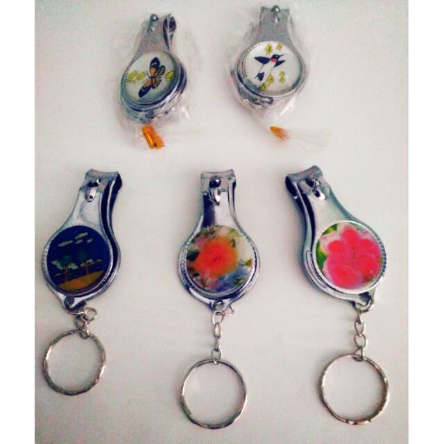 

Souvenir Gunting kuku bulat