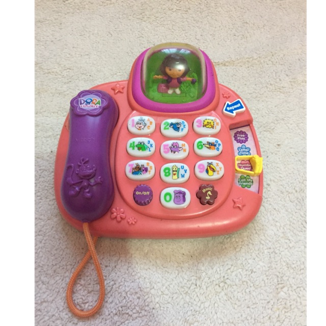 Vtech Dora The Explorer Dial and learn Phone Shopee Indonesia