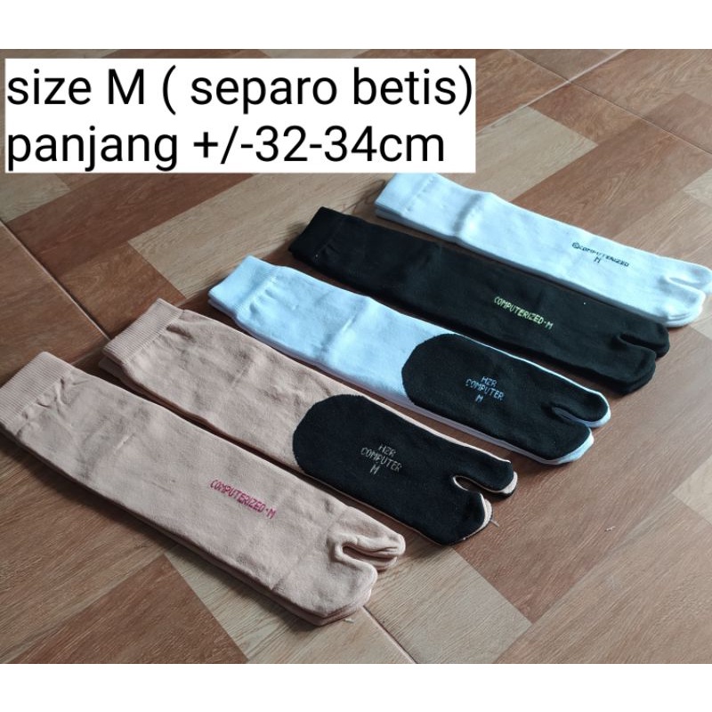 Kaos kaki jempol ukuran L panjang sampai bawah lutut