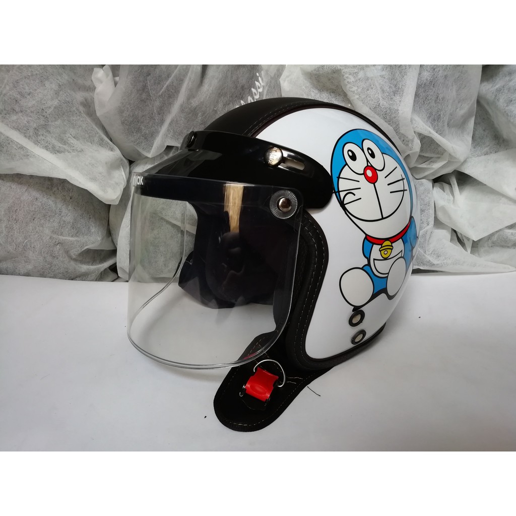 HELM BOGO DORAEMON PUTIH SEMIKULIT DEWASA KACA DATAR BENING