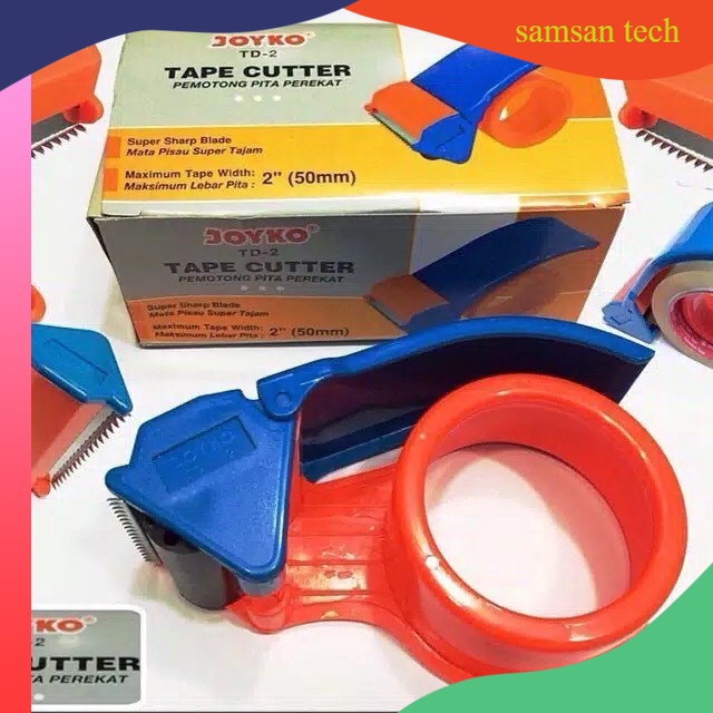 TAPE CUTTER / DISPENSER JOYKO ( Alat Pemotong LAKBAN / ISOLASI ) MURAH