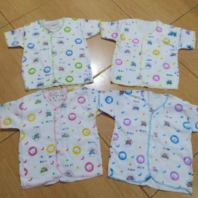 Baju bayi lengan pendek bermotif