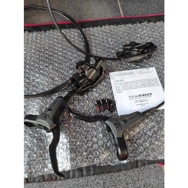 Brake set rem hidrolik tektro BARU..barang sesuai foto.. dijamin ORIGINAL