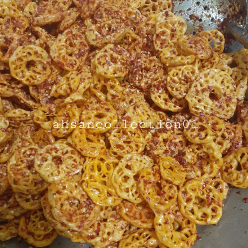 

CEMILAN KRUPUK KRIWIL CIKRUH PEDAS 100GRAM KRUPUK MAWAR MAKANAN RINGAN