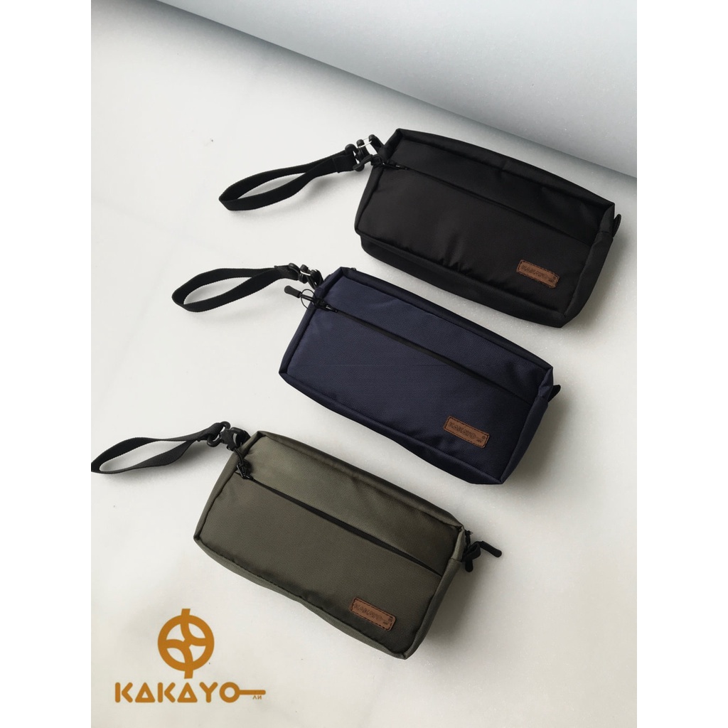 Kakayo/clutch/pouch /tas jinjing/tas  handphone/handbag pria dengan bahan Cordura dan design premium( barang di jamin sama dengan photo,jika terima barang tidak seusai photo uang kembali 100%)