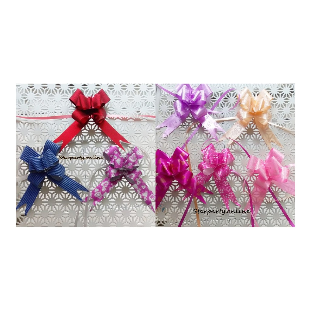 

Pita Serut Harga per 10 pcs 30 mm / Transparant Gold/ Pita Serut 30 Bunga/Hologram