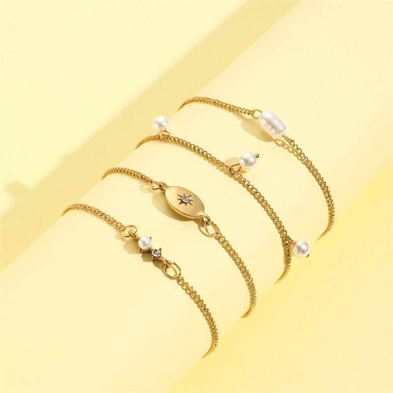 4pcs / Set Gelang Tangan Alloy Lapis Emas Desain Bintang Hias Mutiara Imitasi Untuk Wanita