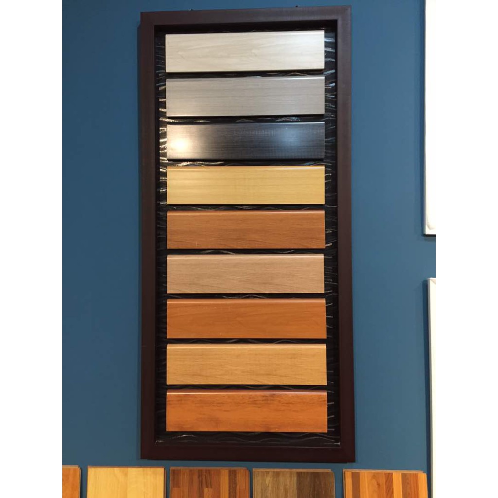 plint pvc motif serat kayu