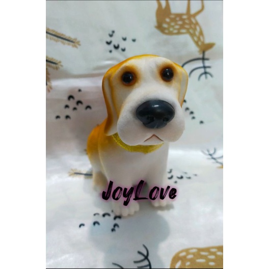 boneka kepala goyang anjing