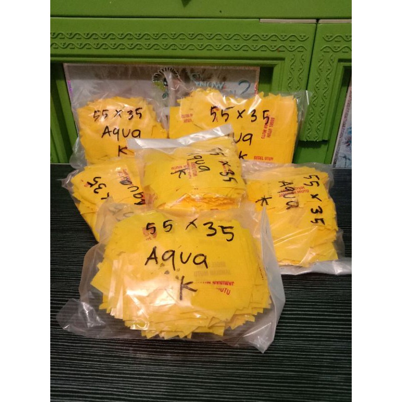 Segel Plastik Tutup Botol Aqua 55 X 35 kuning